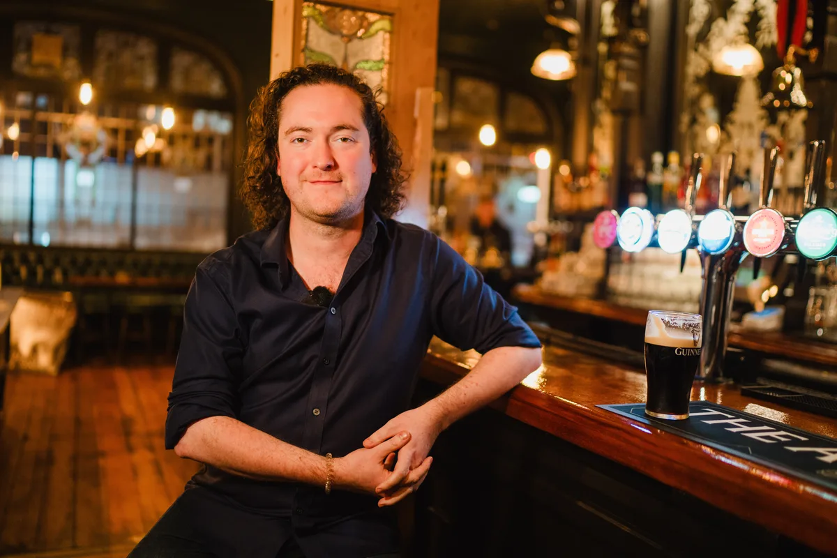 Custodian landlord Peter Connolly behind the 1901 mahogany bar at The Anchor Digbeth
