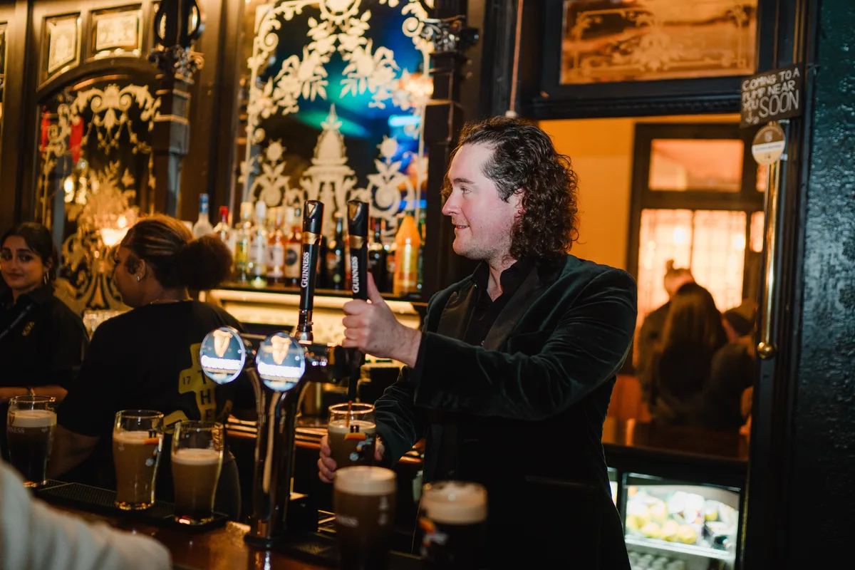 Pulling a creamy two-stage pint of Guinness on vintage founts at The Anchor Digbeth