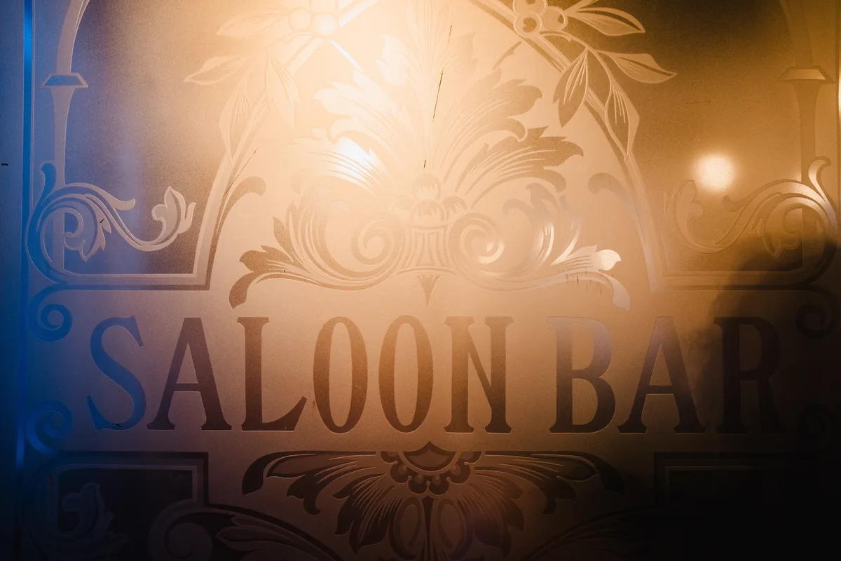Original Saloon Bar acid-etched glass door panel at The Anchor Digbeth